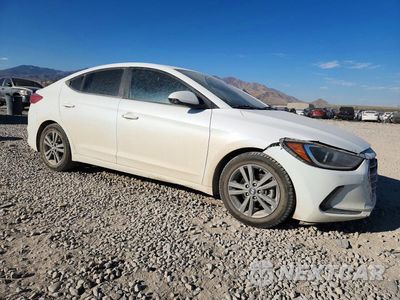 Czwarte zdjęcie samochodu z boku: 2018 HYUNDAI ELANTRA VALUE EDITION VIN:5NPD84LF2JH353216 - miniatura