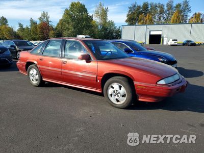 Czwarte zdjęcie samochodu z boku: 1995 PONTIAC GRAND PRIX SE VIN:1G2WJ52M9SF300225 - miniatura