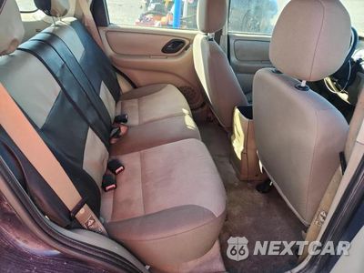 Zdjęcie 11 z 13 samochodu: 2003 FORD ESCAPE XLS VIN:1FMYU02163KE04356 - miniatura