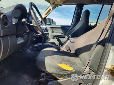 Zdjęcie 7 z 14 samochodu: 2003 JEEP LIBERTY SPORT VIN:1J4GL48K53W554083 - miniatura