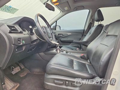Zdjęcie 7 z 13 samochodu: 2017 HONDA PILOT VIN:5FNYF5H5XHB024608 - miniatura