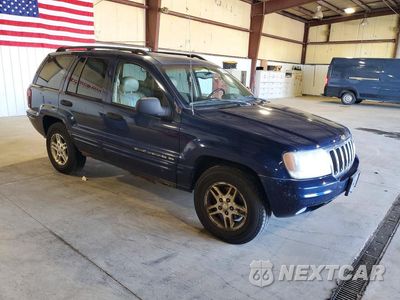Czwarte zdjęcie samochodu z boku: 2002 JEEP GRAND CHEROKEE LAREDO VIN:1J8GW48S52C270202 - miniatura