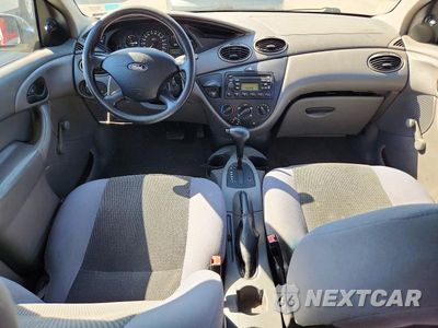 Zdjęcie 8 z 12 samochodu: 2004 FORD FOCUS LX VIN:1FAFP33P44W201800 - miniatura
