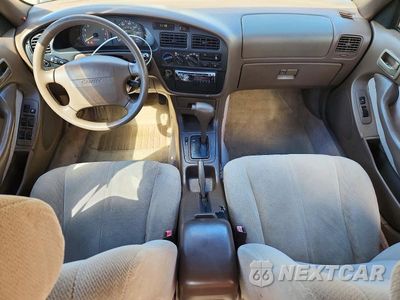 Zdjęcie 8 z 12 samochodu: 1996 TOYOTA CAMRY LE VIN:4T1BG12K9TU729048 - miniatura