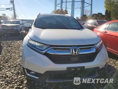 Piąte zdjęcie samochodu w środku: 2017 HONDA CR-V TOURING VIN:2HKRW2H94HH683811 - miniatura