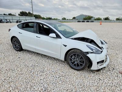 Czwarte zdjęcie samochodu z boku: 2022 TESLA MODEL 3 VIN:5YJ3E1EB9NF181896 - miniatura