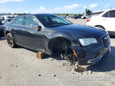 Czwarte zdjęcie samochodu z boku: 2015 CHRYSLER 300C VIN:2C3CCAET3FH781506 - miniatura