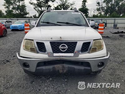 Piąte zdjęcie samochodu w środku: 2010 NISSAN FRONTIER SE V6 VIN:1N6AD0ER6AC418723 - miniatura