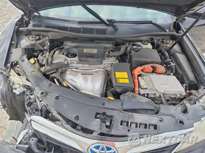 Zdjęcie 11 z 12 samochodu: 2013 TOYOTA CAMRY HYBRID XLE VIN:4T1BD1FK6DU072522 - miniatura