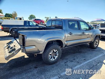 Trzecie zdjęcie samochodu z tyłu: 2016 TOYOTA TACOMA TRD OFF-ROAD VIN:3TMCZ5AN7GM032932 - miniatura