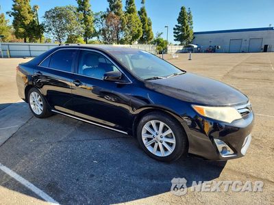 Czwarte zdjęcie samochodu z boku: 2012 TOYOTA CAMRY XLE V6 VIN:4T1BK1FKXCU521981 - miniatura