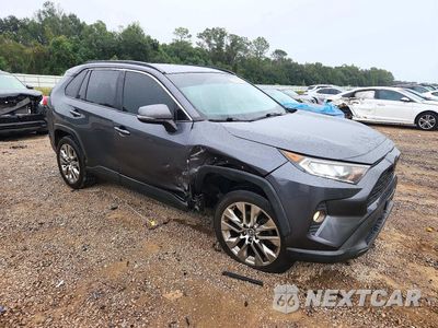 Czwarte zdjęcie samochodu z boku: 2019 TOYOTA RAV4 XLE PREMIUM VIN:JTMC1RFV1KD010243 - miniatura