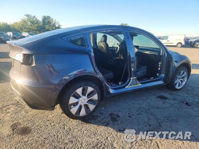 Trzecie zdjęcie samochodu z tyłu: 2023 TESLA MODEL Y VIN:7SAYGDEE6PF978723 - miniatura
