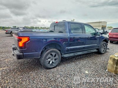 Trzecie zdjęcie samochodu z tyłu: 2025 FORD F150 LIGHTNING LARIAT VIN:1FT6W5L76SWG23508 - miniatura