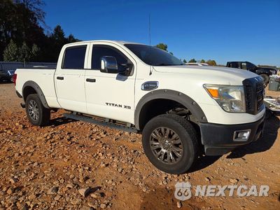 Czwarte zdjęcie samochodu z boku: 2016 NISSAN TITAN XD S VIN:1N6BA1F13GN517251 - miniatura