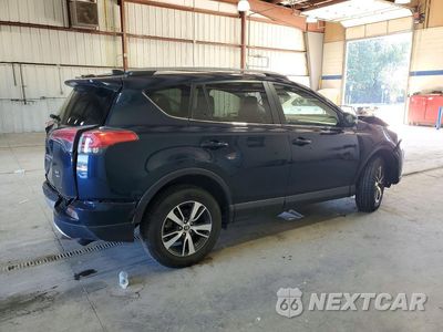 Trzecie zdjęcie samochodu z tyłu: 2018 TOYOTA RAV4 XLE VIN:JTMRFREV9JJ235930 - miniatura