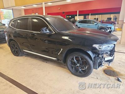 Czwarte zdjęcie samochodu z boku: 2023 BMW X3 XDRIVE30I VIN:5UX53DP08P9S74027 - miniatura