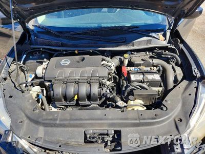 Zdjęcie 11 z 12 samochodu: 2014 NISSAN SENTRA S VIN:3N1AB7AP8EL678981 - miniatura