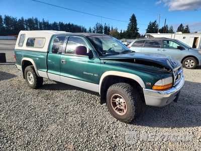 Czwarte zdjęcie samochodu z boku: 1999 DODGE DAKOTA VIN:1B7GG22YXXS264639 - miniatura