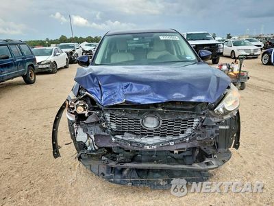 Piąte zdjęcie samochodu w środku: 2014 MAZDA CX-5 TOURING VIN:JM3KE2CY8E0324660 - miniatura