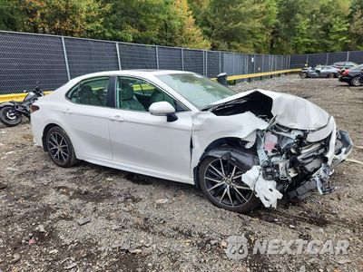 Czwarte zdjęcie samochodu z boku: 2024 TOYOTA CAMRY HYBRID SE VIN:4T1S31AK9RU078459 - miniatura