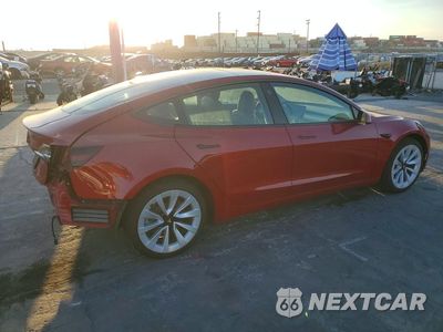 Trzecie zdjęcie samochodu z tyłu: 2022 TESLA MODEL 3 VIN:5YJ3E1EAXNF185852 - miniatura