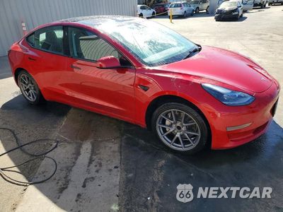 Czwarte zdjęcie samochodu z boku: 2022 TESLA MODEL 3 VIN:5YJ3E1EA8NF289708 - miniatura