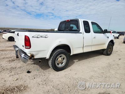 Trzecie zdjęcie samochodu z tyłu: 2001 FORD F150 VIN:1FTRX18W31NA50445 - miniatura