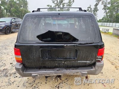 Zdjęcie 6 z 13 samochodu: 1997 JEEP GRAND CHEROKEE LAREDO VIN:1J4FX58S7VC724129 - miniatura