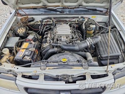 Zdjęcie 12 z 13 samochodu: 1999 HONDA PASSPORT VIN:4S6CK58W8X4409530 - miniatura