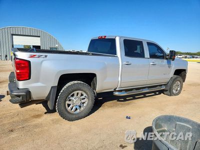 Trzecie zdjęcie samochodu z tyłu: 2016 CHEVROLET SILVERADO K2500 HEAVY DUTY LT VIN:1GC1KVEG3GF100893 - miniatura