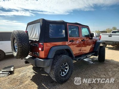 Trzecie zdjęcie samochodu z tyłu: 2014 JEEP WRANGLER UNLIMITED SPORT VIN:1C4BJWDG5EL199200 - miniatura