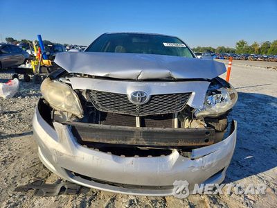 Piąte zdjęcie samochodu w środku: 2010 TOYOTA COROLLA LE VIN:JTDBU4EE4AJ071111 - miniatura