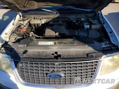 Zdjęcie 11 z 12 samochodu: 2003 FORD EXPEDITION XLT VIN:1FMRU15W73LC16165 - miniatura