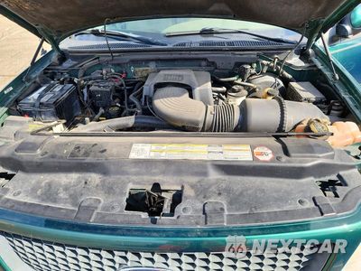 Zdjęcie 11 z 12 samochodu: 2001 FORD F150 SUPERCREW VIN:1FTRW08L41KE34562 - miniatura