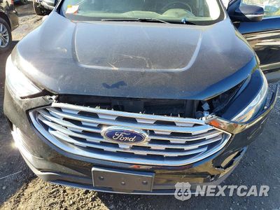 Zdjęcie 11 z 12 samochodu: 2019 FORD EDGE TITANIUM VIN:2FMPK4K92KBB89064 - miniatura