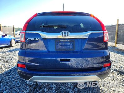 Zdjęcie 6 z 13 samochodu: 2016 HONDA CR-V EX VIN:3CZRM3H53GG712175 - miniatura