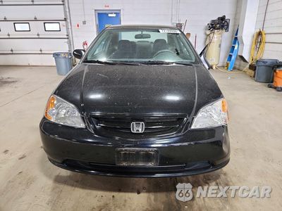 Piąte zdjęcie samochodu w środku: 2001 HONDA CIVIC LX VIN:1HGEM21541L105321 - miniatura