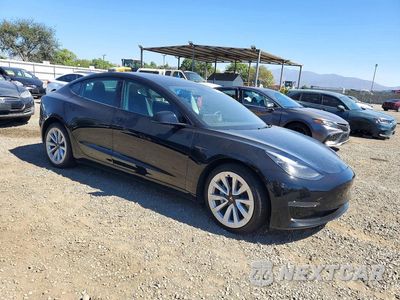 Czwarte zdjęcie samochodu z boku: 2023 TESLA MODEL 3 VIN:5YJ3E1EAXPF572923 - miniatura
