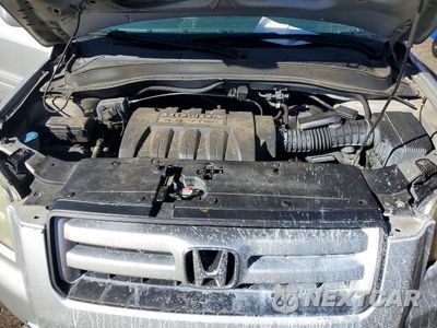 Zdjęcie 11 z 12 samochodu: 2006 HONDA PILOT EX VIN:2HKYF18416H509752 - miniatura