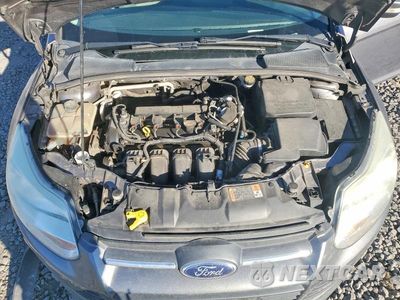 Zdjęcie 11 z 12 samochodu: 2014 FORD FOCUS SE VIN:1FADP3F21EL272043 - miniatura