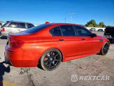 Trzecie zdjęcie samochodu z tyłu: 2014 BMW M5 VIN:WBSFV9C58ED593428 - miniatura