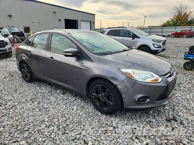 Czwarte zdjęcie samochodu z boku: 2014 FORD FOCUS SE VIN:1FADP3F21EL244873 - miniatura