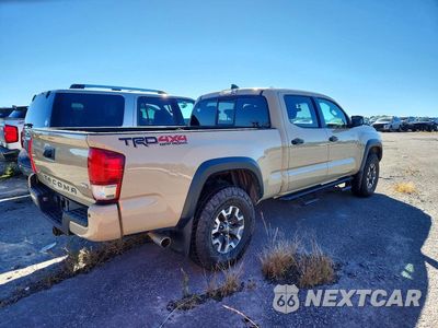 Trzecie zdjęcie samochodu z tyłu: 2016 TOYOTA TACOMA TRD OFF-ROAD VIN:3TMDZ5BN3GM010266 - miniatura