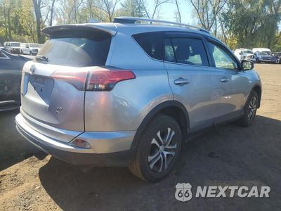 Trzecie zdjęcie samochodu z tyłu: 2018 TOYOTA RAV4 LE VIN:JTMBFREV0JJ229855 - miniatura