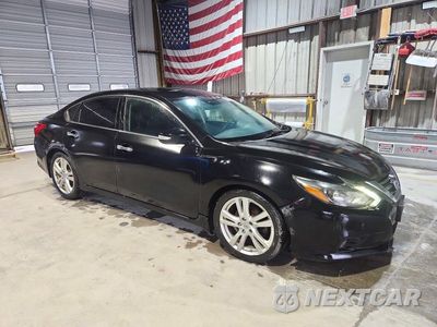Czwarte zdjęcie samochodu z boku: 2017 NISSAN ALTIMA 3.5 SL VIN:1N4BL3AP4HC181360 - miniatura