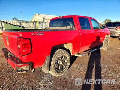 Trzecie zdjęcie samochodu z tyłu: 2017 CHEVROLET SILVERADO K1500 LT VIN:3GCUKREC2HG107562 - miniatura