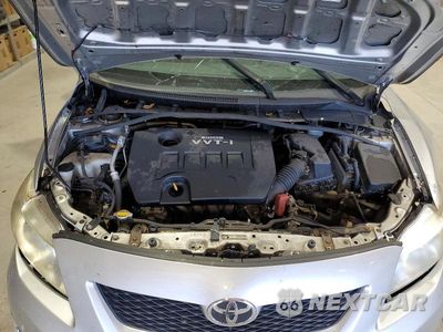 Zdjęcie 11 z 12 samochodu: 2009 TOYOTA COROLLA LE VIN:JTDBL40E399066148 - miniatura