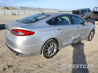 Trzecie zdjęcie samochodu z tyłu: 2017 FORD FUSION SE PHEV VIN:3FA6P0PU2HR306763 - miniatura