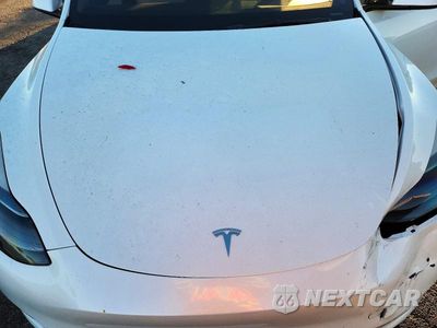 Zdjęcie 11 z 13 samochodu: 2022 TESLA MODEL Y VIN:7SAYGDEF7NF488622 - miniatura
